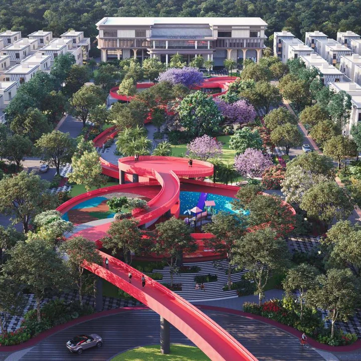 Revasa Là Valora central park aerial with the red elevated walkway looping over the play areas towards Club Valora Revasa Là Valora central park aerial with the red elevated walkway looping over the play areas towards Club Valora